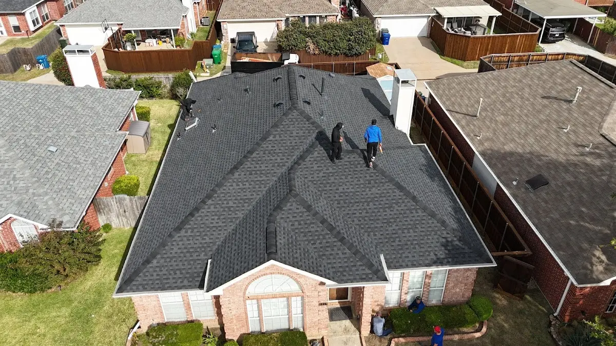 Slate & Tile Roof Repair work in progress on a Englewood property